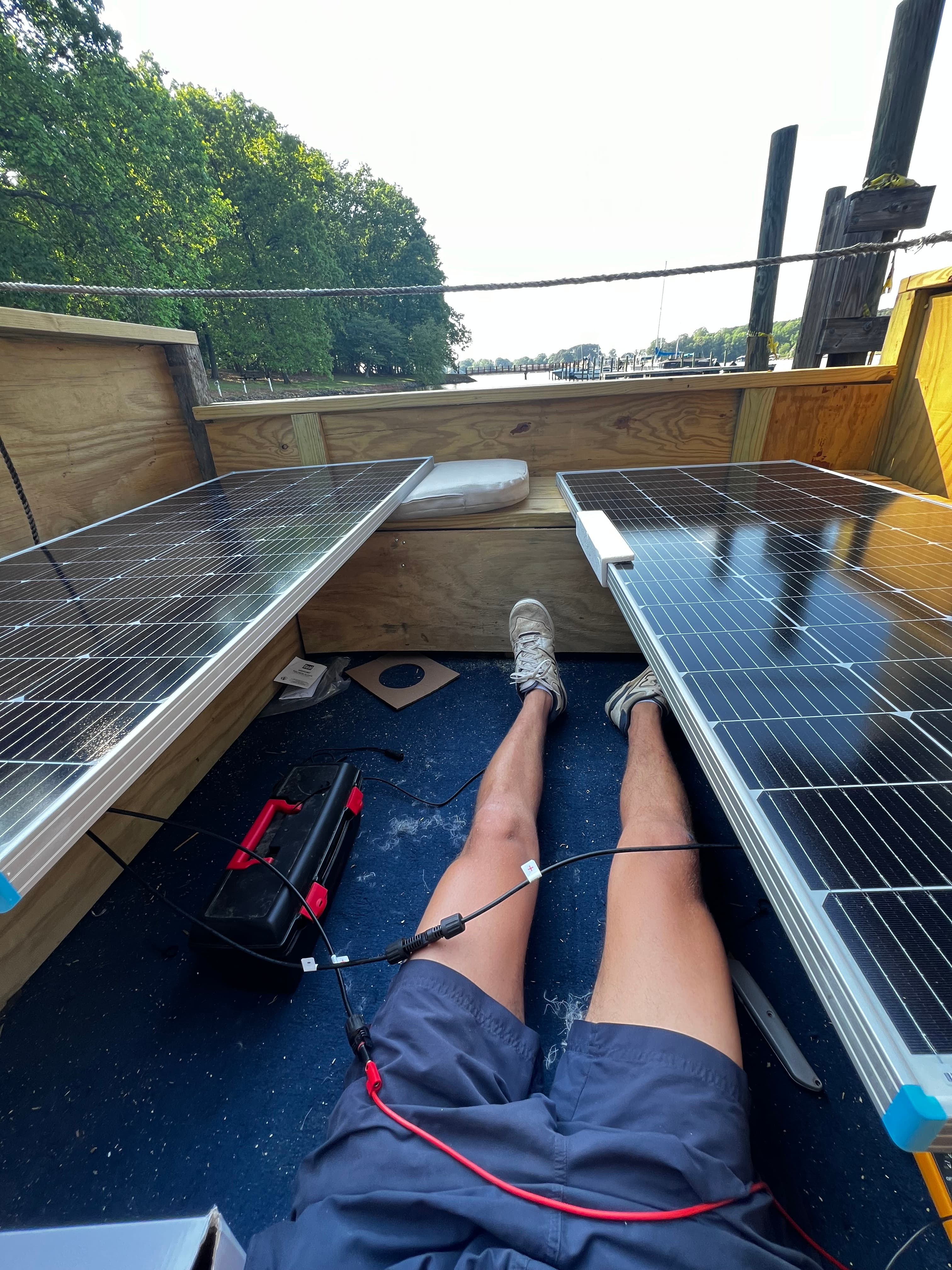 Torqeedo battery with clamp meter reading current on top